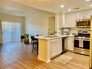 Ritiro Apartments kitchen living room view